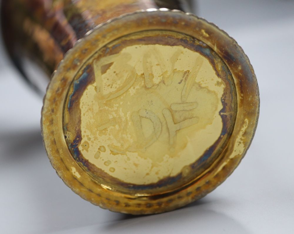 A George V silver gilt beaker, of flared form, Vander & Hedges, London 1912, 11.3cm, 6oz.